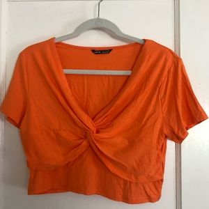 Twist front orange crop top
